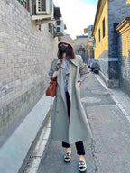 Green Bean Colored Windbreaker Coat for Women, Autumn 2023, Exuding a Stylish Middle-Length and Loose Fit with a Touch of Elegance, British-inspired Overcoat