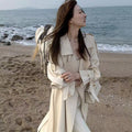 Mid-length above-the-knee trench coat